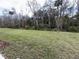 Wooded lot with a grassy area at 2008 Red Rock Rd, New Smyrna Beach, FL 32168