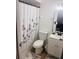 Clean bathroom with shower/tub combo and white vanity at 2677 Tansboro Dr, Deltona, FL 32725