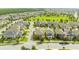 Aerial view of a residential neighborhood with houses and green spaces at 16467 Olive Hill Dr, Winter Garden, FL 34787