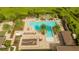 Relaxing community pool with plenty of lounge chairs at 16467 Olive Hill Dr, Winter Garden, FL 34787