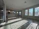 Spacious living area with tile floors and lots of natural light at 16467 Olive Hill Dr, Winter Garden, FL 34787