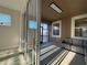 Bright sunroom with sliding glass doors and tiled floors at 16467 Olive Hill Dr, Winter Garden, FL 34787