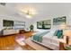 Bright bedroom with hard wood floors, ceiling fan and great view to the backyard at 20319 Macon Pkwy, Orlando, FL 32833