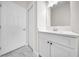 Bathroom showcasing a white vanity with a quartz countertop and modern hardware at 15062 Sw 63Rd Court Rd, Ocala, FL 34473