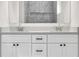 Modern bathroom featuring double sinks, a quartz countertop and a tiled shower at 15062 Sw 63Rd Court Rd, Ocala, FL 34473