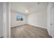 Inviting bedroom featuring a window with natural light and neutral walls at 15062 Sw 63Rd Court Rd, Ocala, FL 34473