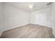 Spacious bedroom featuring modern flooring, ample closet space, and neutral walls at 15062 Sw 63Rd Court Rd, Ocala, FL 34473