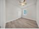 Bedroom boasts wood-look floors, a ceiling fan and a convenient closet at 15062 Sw 63Rd Court Rd, Ocala, FL 34473