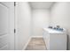 Laundry room complete with wood-look floors, a washer and dryer at 15062 Sw 63Rd Court Rd, Ocala, FL 34473