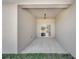 Covered patio with a concrete floor, offering a sheltered outdoor space with a view of the backyard at 15062 Sw 63Rd Court Rd, Ocala, FL 34473