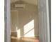 Bright bedroom with modern air conditioning unit and hardwood floors at 575 2Nd St, Oviedo, FL 32765
