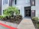 Modern building exterior with landscaping and walkway at 7770 Sandy Ridge Dr # 18-129, Reunion, FL 34747