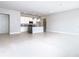 Modern kitchen with white cabinets and island at 7770 Sandy Ridge Dr # 18-129, Reunion, FL 34747