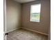 Simple bedroom with carpeted floor and window at 9279 Gran Teatro Dr, Winter Garden, FL 34787