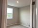 Bright bedroom with carpeted floor and window at 9279 Gran Teatro Dr, Winter Garden, FL 34787