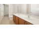 Bathroom with double sinks and a large mirror at 11757 Fitzgerald Butler Rd, Orlando, FL 32836