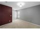 Bedroom with burgundy and gray walls at 11757 Fitzgerald Butler Rd, Orlando, FL 32836