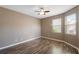 Spacious bedroom with hardwood floors and ceiling fan at 11757 Fitzgerald Butler Rd, Orlando, FL 32836