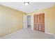 Bright bedroom with ample closet space and neutral walls at 11757 Fitzgerald Butler Rd, Orlando, FL 32836