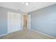 Bedroom with a large closet and carpet at 11757 Fitzgerald Butler Rd, Orlando, FL 32836