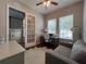 Spacious home office with French doors and a view of the staircase at 1366 Ponce Dr, Celebration, FL 34747