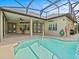 Private, screened pool and outdoor living area at 143 Brunswick Dr, Davenport, FL 33837