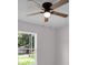 Bedroom with ceiling fan and window view at Tbd Kilgore St, Wildwood, FL 34785