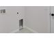 Simple laundry room with utility hookups and shelving at Tbd Kilgore St, Wildwood, FL 34785