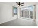 Spacious bedroom with tile floors and large window with city views at 322 E Central Blvd # 1711, Orlando, FL 32801