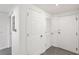 Entryway with white doors and tiled floor at 322 E Central Blvd # 1711, Orlando, FL 32801