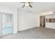 Spacious living room with tile floors and access to balcony at 322 E Central Blvd # 1711, Orlando, FL 32801