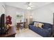 Versatile bedroom with a sofa and workspace at 805 Nelson Dr, Kissimmee, FL 34758