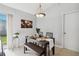 Kitchen dining area with table and bench seating at 805 Nelson Dr, Kissimmee, FL 34758