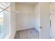 Walk-in closet features carpet flooring and white wire shelving at 9982 Fiddley Aly, Orlando, FL 32827