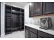 Mud Room featuring custom shelving for storage and a coffee station on the counter at 16695 Broadwater Ave, Winter Garden, FL 34787