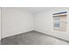 Simple bedroom with grey carpet and a window at 258 Vizcay Way, Davenport, FL 33837