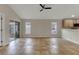 Spacious living room with tile floors and sliding glass doors at 258 Vizcay Way, Davenport, FL 33837