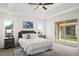 Main bedroom with plush carpet, ceiling fan and natural light at 258 Vizcay Way, Davenport, FL 33837