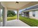 Covered patio with access to backyard at 258 Vizcay Way, Davenport, FL 33837