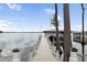 View down boat dock toward the lake and other boat houses at 904 Main St, Windermere, FL 34786