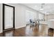 Bright home office with wood floors, shutters, and a mirrored accent wall at 904 Main St, Windermere, FL 34786