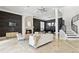 Elegant living room featuring a fireplace, staircase, and modern decor creating a cozy and stylish atmosphere at 904 Main St, Windermere, FL 34786