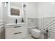 Stylish powder room with modern fixtures and decorative wall details at 904 Main St, Windermere, FL 34786