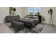 Well decorated bedroom offers comfort with a queen bed, side tables and dresser at 487 Toscano St, Clermont, FL 34715