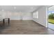 Open living space with lots of natural light and modern flooring at 487 Toscano St, Clermont, FL 34715