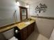 Updated bathroom boasts granite counters, mosaic backsplash, and updated hardware at 588 Orange Dr # 131, Altamonte Springs, FL 32701