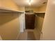Walk-in closet with built in shelving and room to store personal belongings at 588 Orange Dr # 131, Altamonte Springs, FL 32701