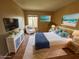 Relaxing main bedroom suite with a view, soft textures, and light, neutral colors at 588 Orange Dr # 131, Altamonte Springs, FL 32701