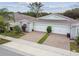 Aerial view of the home featuring a lush lawn and landscaping at 1862 Overcup Ave, Saint Cloud, FL 34771