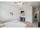 Bedroom featuring a ceiling fan, a mounted TV, and a closet at 1862 Overcup Ave, Saint Cloud, FL 34771